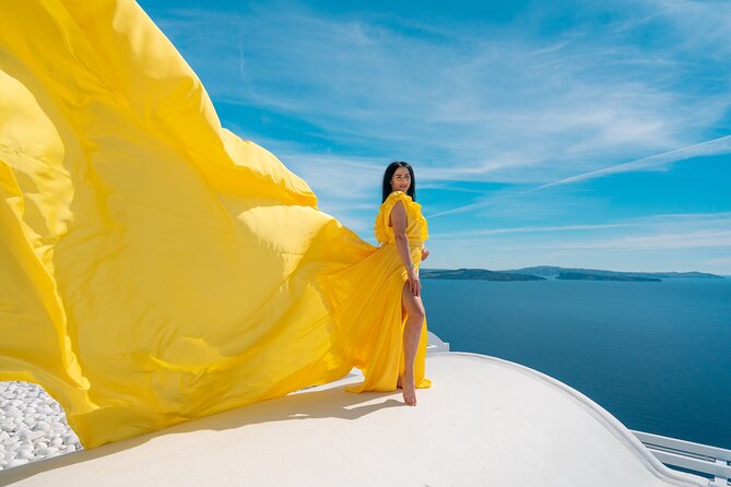 Santorini Oia: Private Flying Dress Photoshoot - Booking Confirmation and Accessibility