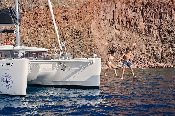 Santorini Oia: Private Sunset Catamaran Cruise With Bbq/Drinks - Spectacular Sunset Views in Oia