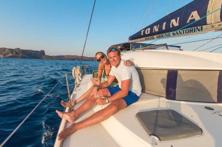 Santorini: Private Catamaran Cruise With Food & Drinks - Booking and Cancellation Policies