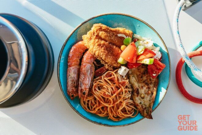 Santorini: Private Catamaran Tour With BBQ Meal and Drinks - Spectacular Caldera Views