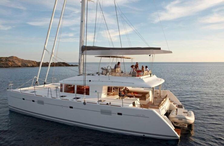 Santorini: Private Luxury Catamaran Cruise With Greek Meal - Language and Pickup Locations