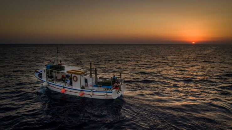 Santorini Sunset Fishing Trip With Dinner and Drinks - Experience Highlights