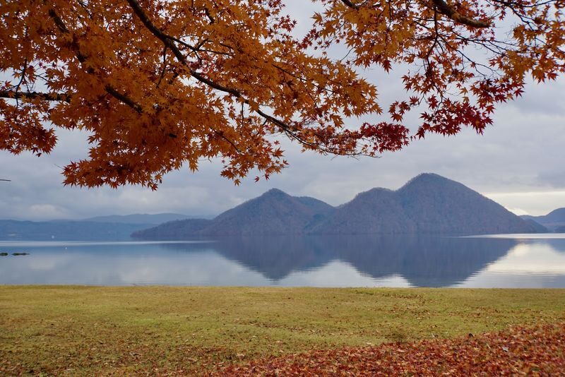 Sapporo Departure: Day Trip to Big Buddha, Jozankei, Lake Toya & Noboribetsu: Volcano/Lake View/Winter Snowmobiling - Showa-shinzan: a young volcano and an optional bear stop