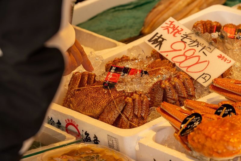 Sapporo Market & Seafood Brunch Tour: Taste Hokkaidos Freshness - The guide makes the difference