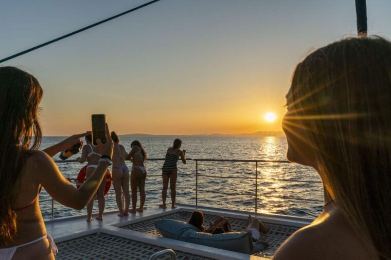 Sarenal: Sunset Catamaran Cruise With BBQ - Onboard Experience