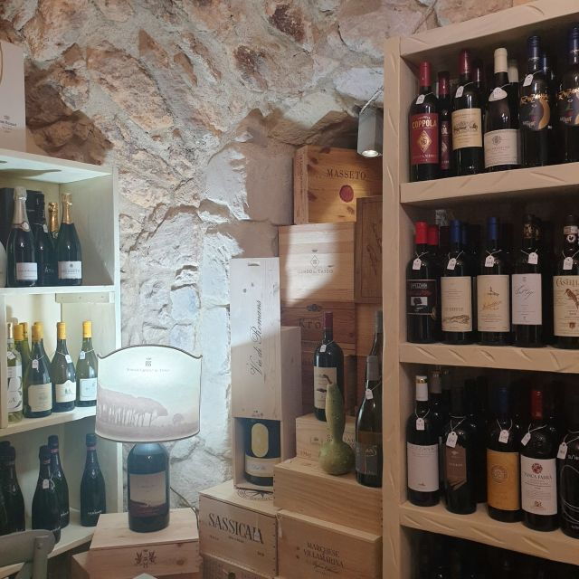 Sassari: Visit to a Historic Shop & Aperitif - Experience Details