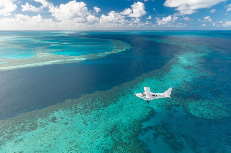 Scenic Flight Heart Reef, Whitehaven beach from Airlie Beach - Who will enjoy this flight most?