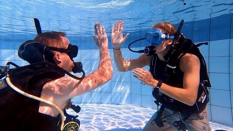 Scuba Wonders Discovery for Beginners with PADI 5</em> Dive Center – From Alona Beach to your first breath underwater’ /></p>
<p><p>This is a beginner introduction to scuba, not a tour built around a long boat ride or a full day at sea. You meet at Alona Beach in Panglao, get an orientation on safety and equipment, and then work through basic skills with a PADI instructor before heading into open water.</p>
</p>
<p><p>That order matters. Scuba can feel unfamiliar at first: you’re breathing through a regulator, wearing equipment that changes how you move, and learning to respond calmly underwater. Practicing in confined water gives you time to get used to those basics before you go farther.</p>
</p>
<p><p>After the practice session, you make an open-water outing with the instructor directly supervising. The aim is to use the skills you have just learned while seeing marine life in its natural setting. The description does not specify a particular reef, route, or list of animals, so treat the exact sights as dependent on the conditions and location that day.</p>
</p>
<p><p>A participant reported reaching 11 meters, which gives you a sense of the possible depth, not a guaranteed target. Your instructor will guide the session, and you should follow their directions rather than treating that number as a benchmark. For some beginners, the real milestone is simply becoming comfortable enough to breathe and look around.</p>
</p>
<p><p>The experience ends with a short debriefing, with time for questions and feedback. That is a useful close to a first session: you can talk through what felt easy, what took practice, and whether you want to continue learning.</p>
</p>
<div style="margin: 20px 0; padding: 15px 0;"><p>You can also read our reviews of more scuba diving tours in Panglao</p><ul style="margin: 10px 0; padding: 0; list-style: none;"><li style="margin: 0 0 10px 0; padding: 0 0 10px 0; border-bottom: 1px solid #eee; display: flex; align-items: flex-start; gap: 12px; line-height: 1.4;"><a href="https://veronikasadventure.com/discover-scuba-diving-in-bohol/" aria-hidden="true" tabindex="-1"><img decoding="async" style="width: 80px; height: 60px; object-fit: cover; border-radius: 4px; flex-shrink: 0;" src="https://veronikasadventure.com/wp-content/uploads/2026/10/discover-scuba-diving-in-bohol-150x150.jpg" alt="" loading="lazy"></a><div><a href="https://veronikasadventure.com/discover-scuba-diving-in-bohol/">Discover Scuba Diving in Bohol</a><br><span style="font-size: 0.82em; color: #555; margin-top: 2px;"><span style="color: #f5a623;">★</span> 4.8 · 34 reviews</span></div></li><li style="margin: 0 0 10px 0; padding: 0 0 10px 0; border-bottom: 1px solid #eee; display: flex; align-items: flex-start; gap: 12px; line-height: 1.4;"><a href="https://veronikasadventure.com/panglao-helmet-diving-experience-with-photos-and-videos-2/" aria-hidden="true" tabindex="-1"><img decoding="async" style="width: 80px; height: 60px; object-fit: cover; border-radius: 4px; flex-shrink: 0;" src="https://veronikasadventure.com/wp-content/uploads/2026/04/panglao-helmet-diving-experience-with-photos-and-videos-2-150x150.jpg" alt="" loading="lazy"></a><div><a href="https://veronikasadventure.com/panglao-helmet-diving-experience-with-photos-and-videos-2/">Panglao: Helmet Diving Experience with Photos and Videos</a><br><span style="font-size: 0.82em; color: #555; margin-top: 2px;"><span style="color: #f5a623;">★</span> 5.0 · 3 reviews</span></div></li><li style="margin: 0; padding: 0; border-bottom: none; display: flex; align-items: flex-start; gap: 12px; line-height: 1.4;"><a href="https://veronikasadventure.com/refresh-your-dive-skills-bohol-s-scuba-tune-up-with-padi-5-center/" aria-hidden="true" tabindex="-1"><img decoding="async" style="width: 80px; height: 60px; object-fit: cover; border-radius: 4px; flex-shrink: 0;" src="https://veronikasadventure.com/wp-content/uploads/2026/10/refresh-your-dive-skills-bohol-s-scuba-tune-up-with-padi-5-center-150x150.jpg" alt="" loading="lazy"></a><div><a href="https://veronikasadventure.com/refresh-your-dive-skills-bohol-s-scuba-tune-up-with-padi-5-center/">Refresh Your Dive Skills: Bohol’s Scuba Tune-Up with PADI 5* Center</a><br><span style="font-size: 0.82em; color: #555; margin-top: 2px;"><span style="color: #f5a623;">★</span> 5.0 · 1 reviews</span></div></li></ul></div><h2 id="section-2">Small groups and instructor attention</h2>
<p><img src=