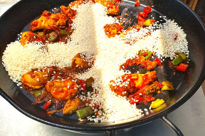 Seafood Paella Cooking Classes a Private Rooftop in Madrid - The Sum Up