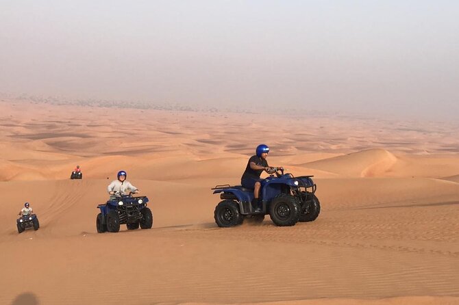 Self Drive Quad Bike in Open Desert With Sand Boarding and Camels - Common Questions