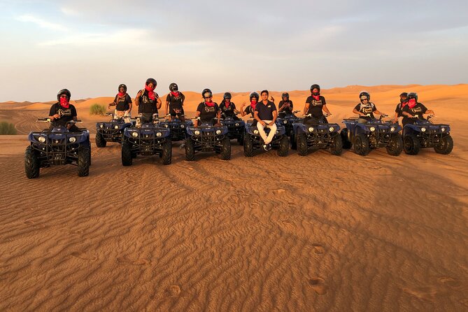 Self-Drive Quad Bike With Sand Boarding and Camel Ride in Dubai - Sand Boarding Adventure