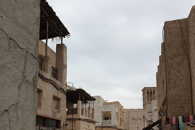 Semi-Private Walking Tour With Pickup and Breakfast in Old Dubai - Exploring Old Dubais Landmarks