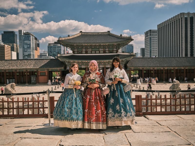 Seoul Gyeongbokgung Hanbok Photoshoot & Korean History Tour - Gyeonghoeru Pavilion and its pond