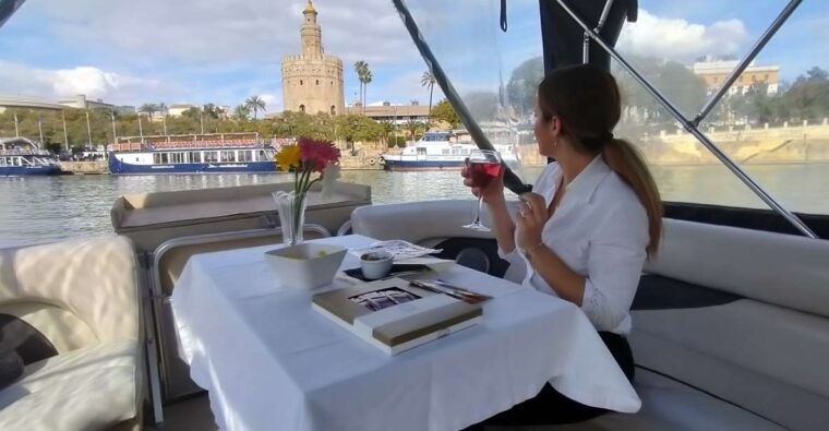 Seville: Exclusive River Boat Tour With Tapas - Onboard Experience