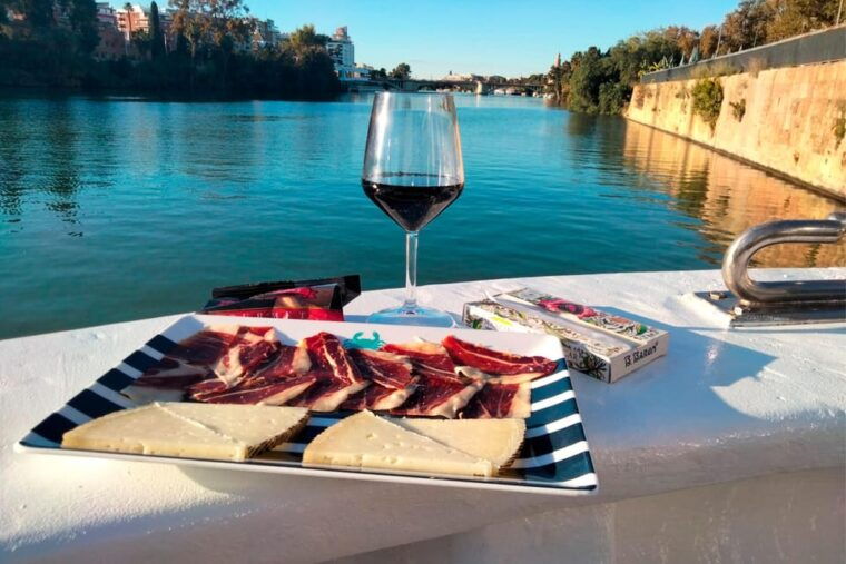 Seville: Restaurant Boat Ride on the Guadalquivir River With Lunch/Dinner - Suitability and Dress Code