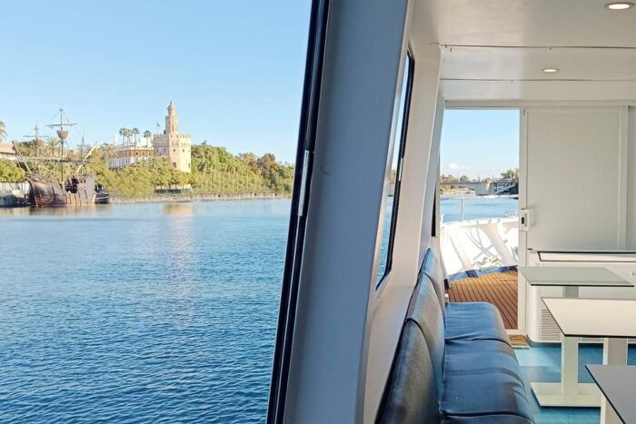 Seville: Restaurant Boat Ride on the Guadalquivir River With Lunch/Dinner - Booking and Cancellation Policy