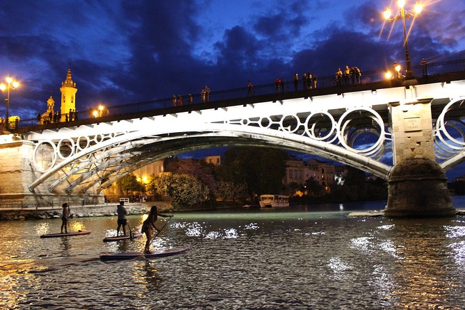Seville: Sunset in Paddle Surf - Pricing and Copyright