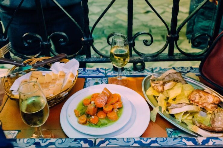 Seville: Tapas Tour Across the River in Triana - Experience Trianas Flavors