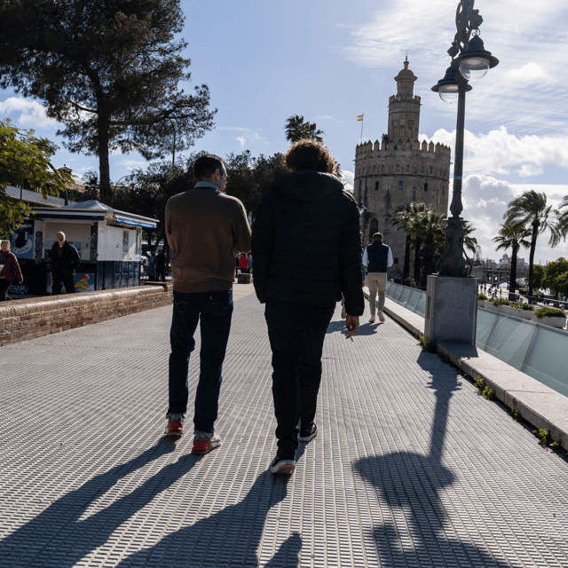 Seville: Tiny-Group Triana Iconic Neighborhood Walking Tour - Exploring the Vibrant Mercado De Triana