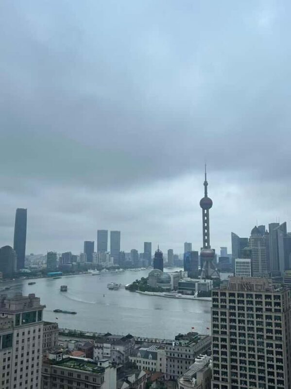 Shanghai: Fake Market, Bund, and Fabric Market Tour - Strolling Along the Bund: Views and Stories