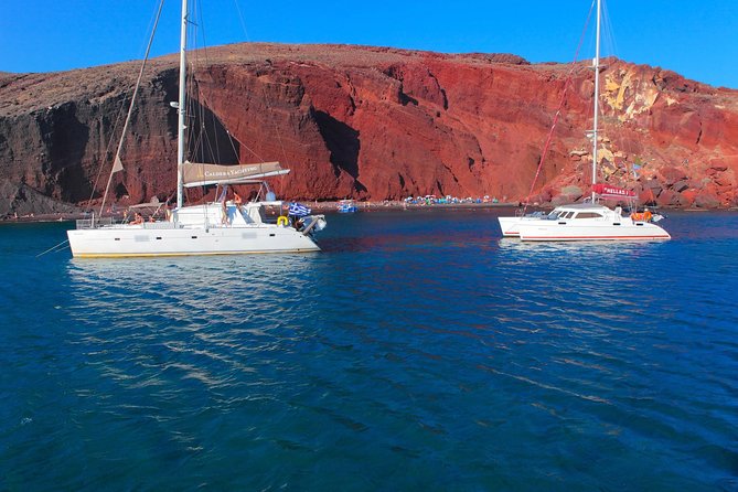 Shared Catamaran Romantic Sunset Cruise From Santorini via Volcano - Delicious Greek Barbecue Lunch With Wine