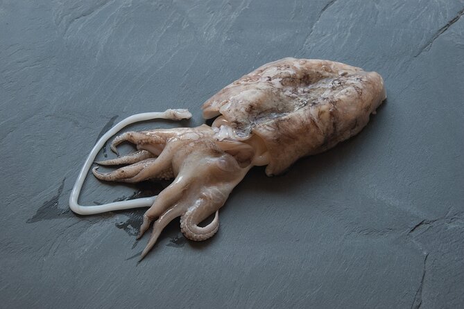 Shared Quality Fresh Shellfish Dinner in Barcelona - Common Questions