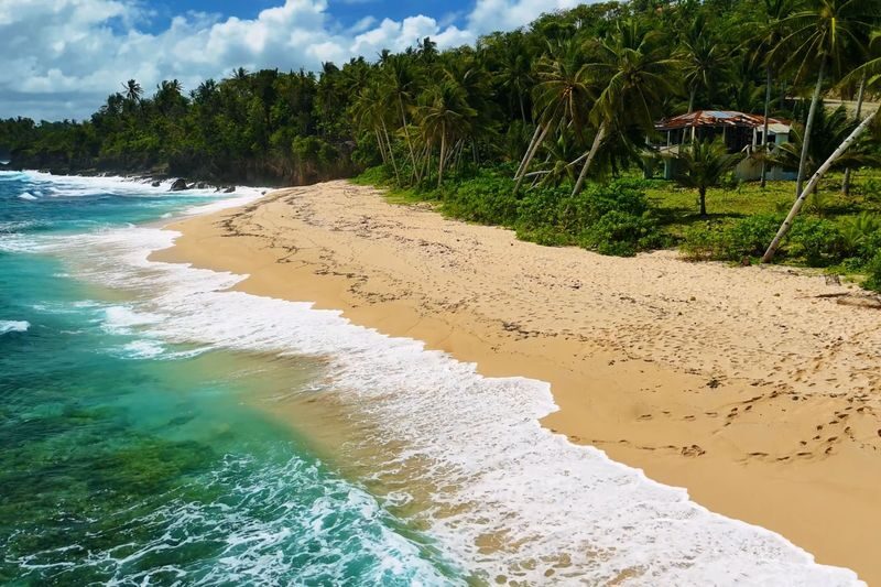 Siargao Island Private Full-Day Discovery Tour - Cloud 9 closes the day with surf and sunset views