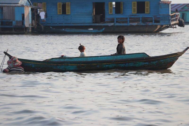 Siem Reap Floating Village Half-Day Small Group Cruise - A small boat carries you into the floating village