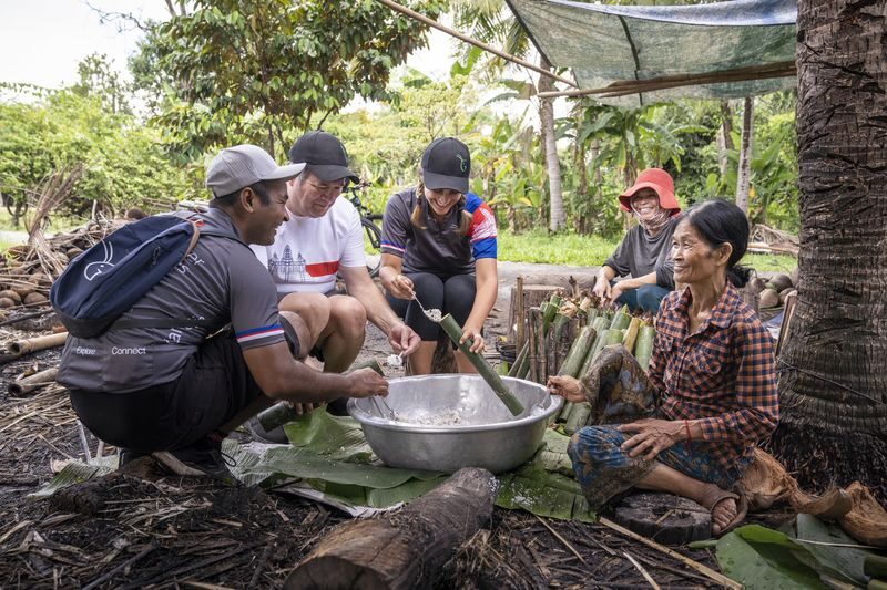 Siem Reap Ultimate Countryside E-Bike Tour - Taking a break at a village home