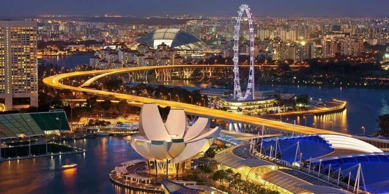 Singapore: Night Tour with River Cruise & Light Shows - Transportation and Group Dynamics