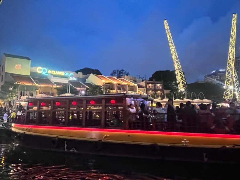 Singapore: Night Tour with River Cruise & Light Shows - Guide Experience and Authenticity