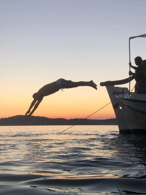 Skiathos: Boat Cruise with Dinner & Sunset Viewing - The Sum Up
