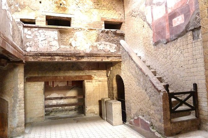 Skip the Line Half Day Private Tour of Herculaneum Highlights With Local Guide - Overview of Herculaneums Ancient Ruins