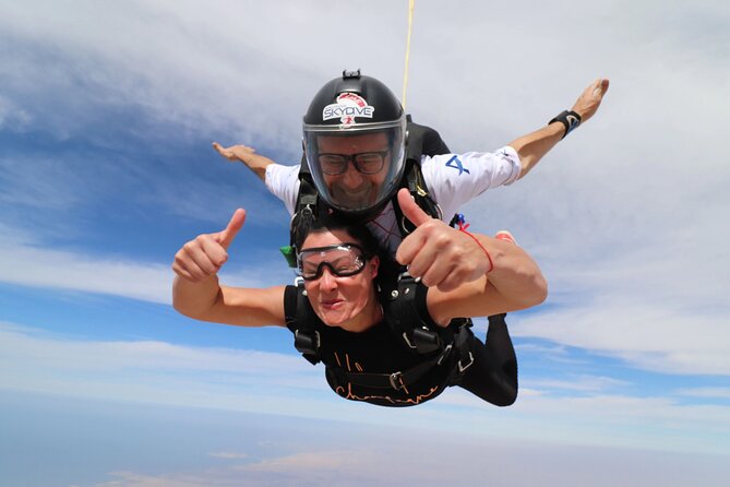 Skydive Dubai Tandem Over The Palm With Transfer - Safety Measures and Equipment for Tandem Skydiving