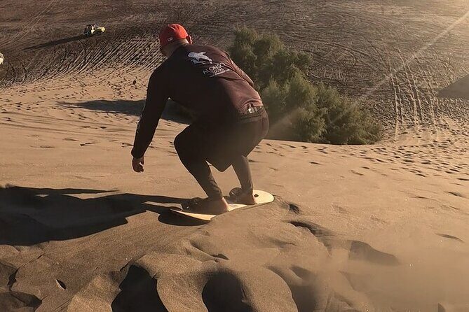 Slide into the sunset by Sandboarding in Las Dunas Del Mogote - Good To Know