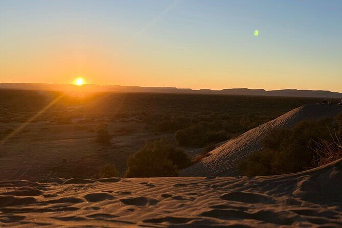Slide into the sunset by Sandboarding in Las Dunas Del Mogote - Authentic Insights from Reviews