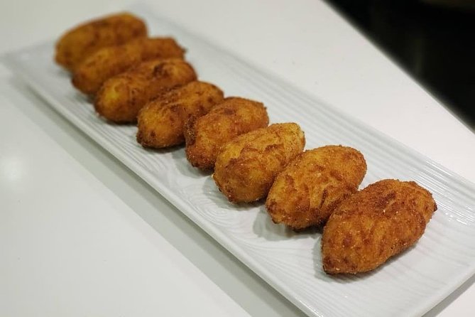 Small Group Cooking Class of Tapas and Paella in Madrid - The Sum Up