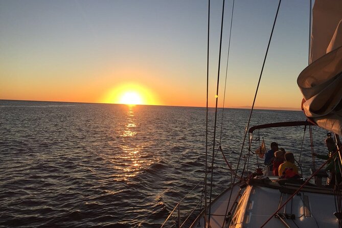 Small-Group Guided Sunset Sailing Trip to Dia Island From Heraklion - Additional Information and Weather Conditions