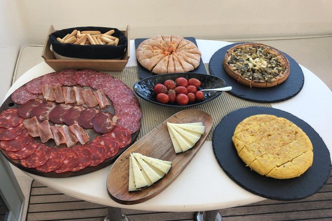 Small-Group Whale and Dolphin-Watching Tour by Catamaran - Tenerife - Mixed Experiences and Challenges