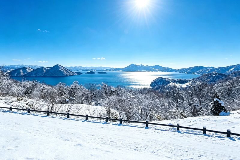 (Snow Viewing Limited) Hokkaido Noboribetsu Jigokudani / Lake Toya / Lake Hill Farm / Showa-shinzan | Optional Snowmobile Experience | Departing from Sapporo | English and Chinese Speaking Guide - Lake Toya’s lookout and the snowmobile choice