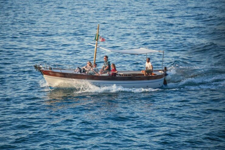 Sorrento: Gozzo Boat Coastal Cruise With Swim and Limoncello - Itinerary Highlights
