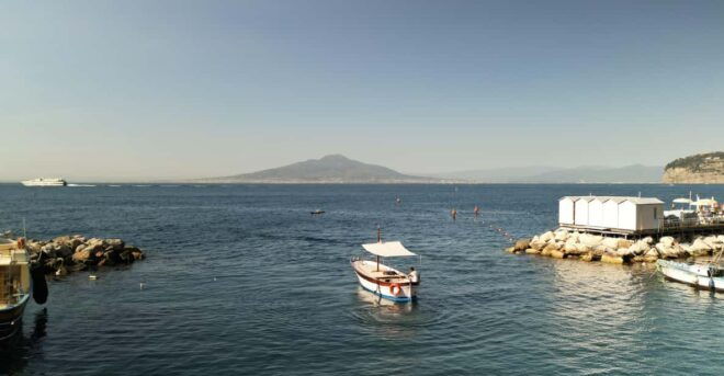 Sorrento: Gozzo Boat Coastal Cruise With Swim and Limoncello - Boat and Cruising Experience