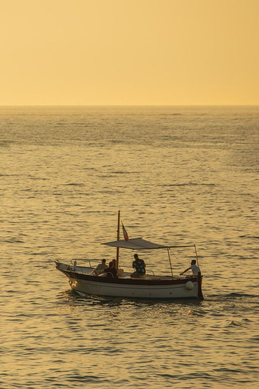 Sorrento Sunset Experience on a Traditional Gozzo Boat - Itinerary Highlights