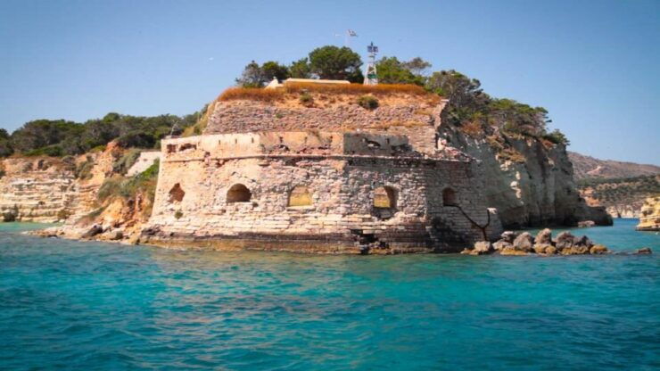 Souda Bay: Marathi, Cape Drepano and Caves Boat Cruise - Activity Overview