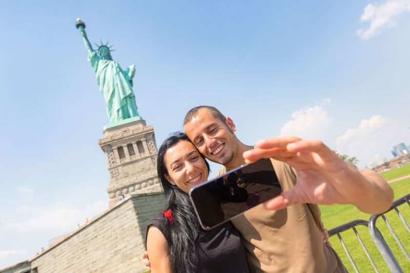 Statue of Liberty and Ellis Island Priority Boarding Tour - A harbor crossing with two sides of the American story