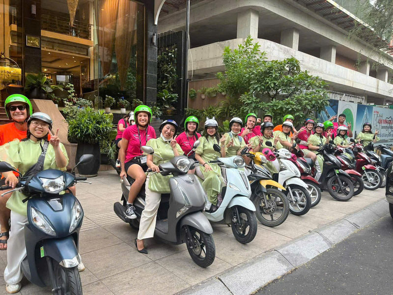 Street Food Tour with 11 Tastings & Michelin Dish by Motorbike - City stories between the food stops