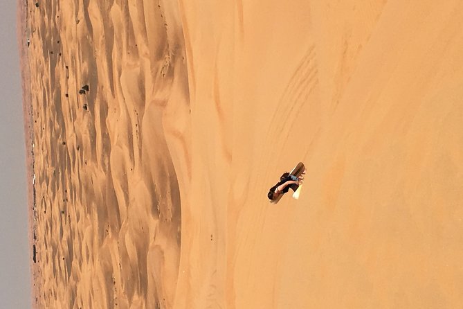 Sun Rise Desert Safari & Sandboarding (Private Vehicle) - Sandboarding Techniques and Tips