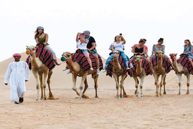 Sun Rise Desesrt Safari With Camel Ride by 4x4 Land Cruiser - Sand Boarding Included