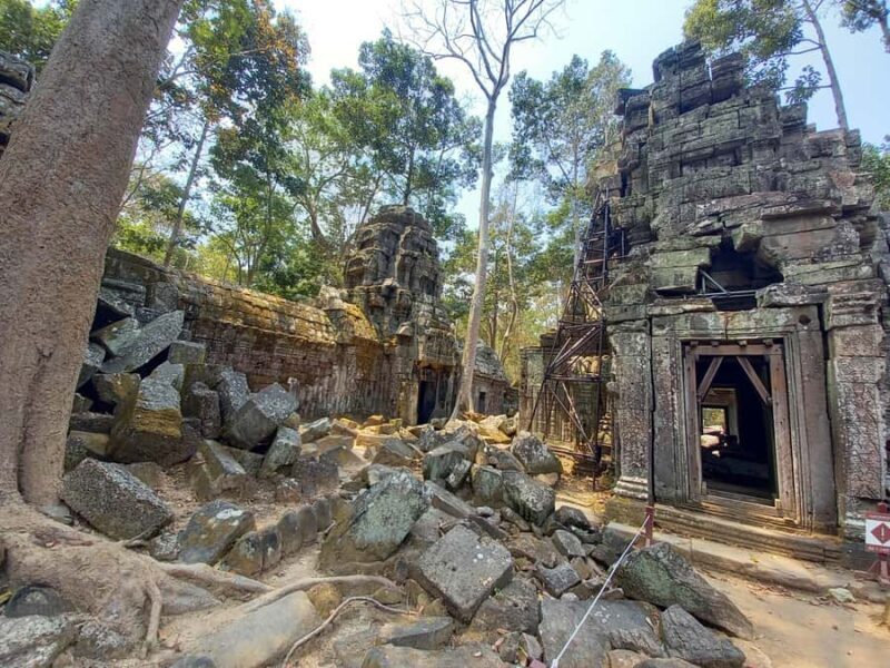 Sunrise at Angkor Wat, explore other temples with a Spanish-speaking guide. - Transportation and logistics