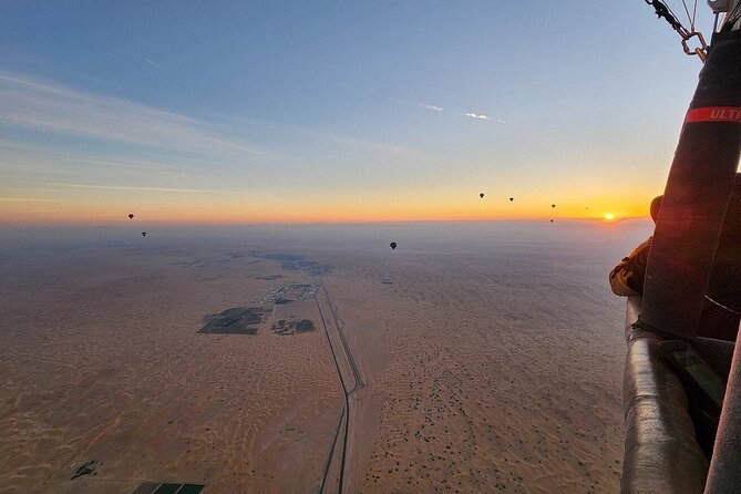 Sunrise Hot Air Balloon Tour Over Dubai Desert - Pickup Details and Cancellation Policy